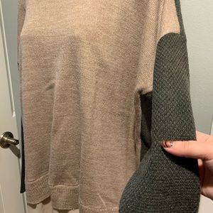 A multicolored sweater with a cute chiffon layer